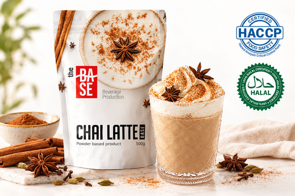 The Base Chai Latte – packaging with styled chai latte drink, HACCP and Halal certified badges