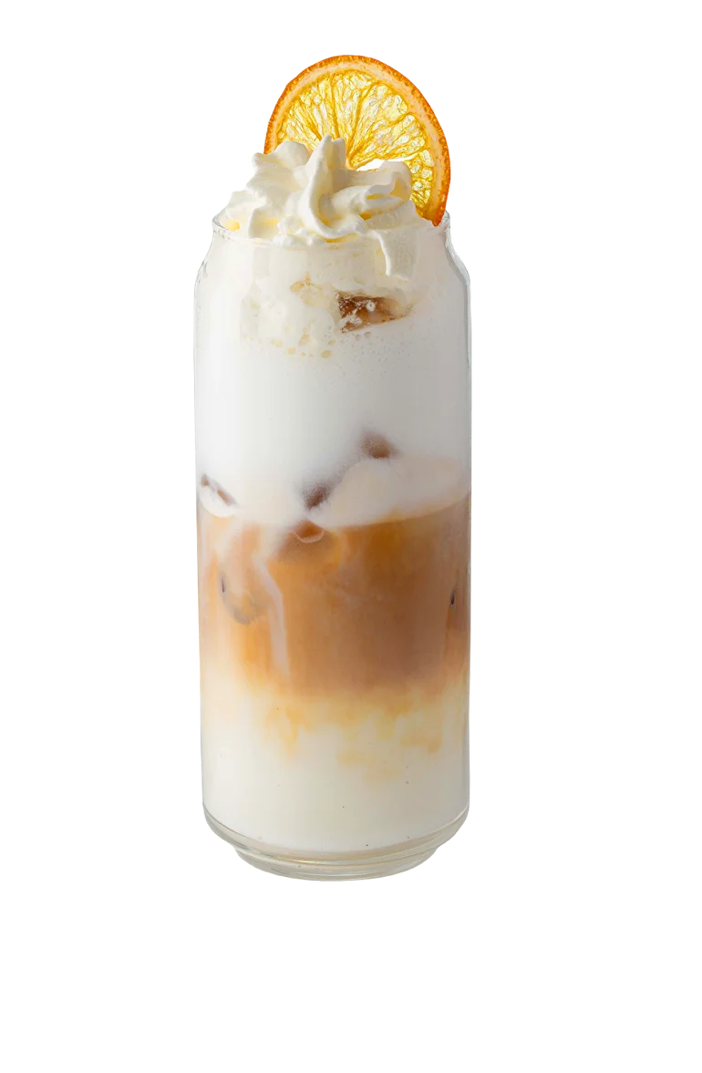 The Base Cream Latte layered drink with whipped cream and dried orange garnish